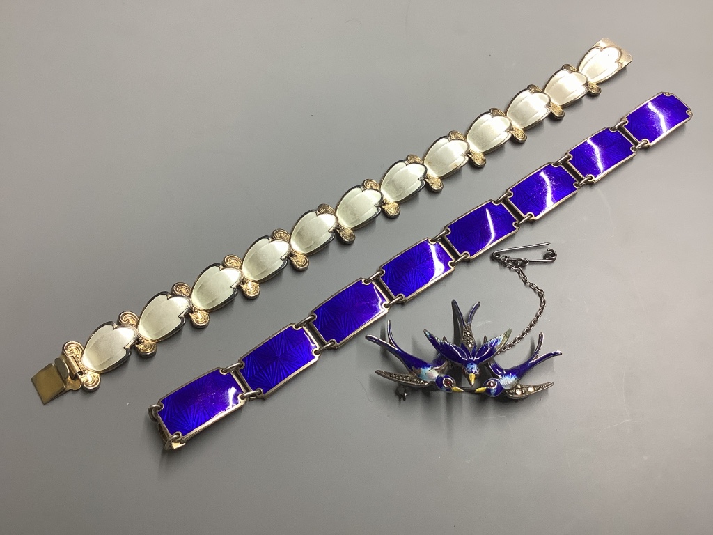 Two Norwegian 925 and enamel bracelets largest 19cm and a similar 'Swallow' brooch.